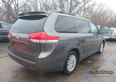 2011 Toyota Sienna Xle V6 z USA, uszkodzony, nr VIN 5TDYK3DC6BS021969